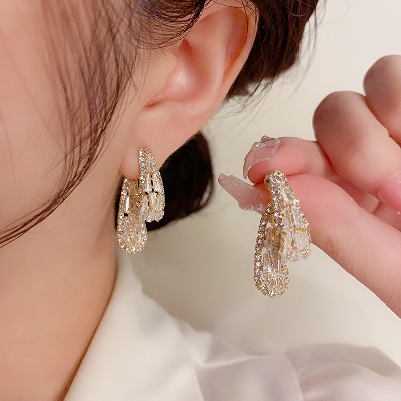 韩式精致气质时尚锆石耳坠前后戴女s925银针名媛风轻奢高级感耳环图