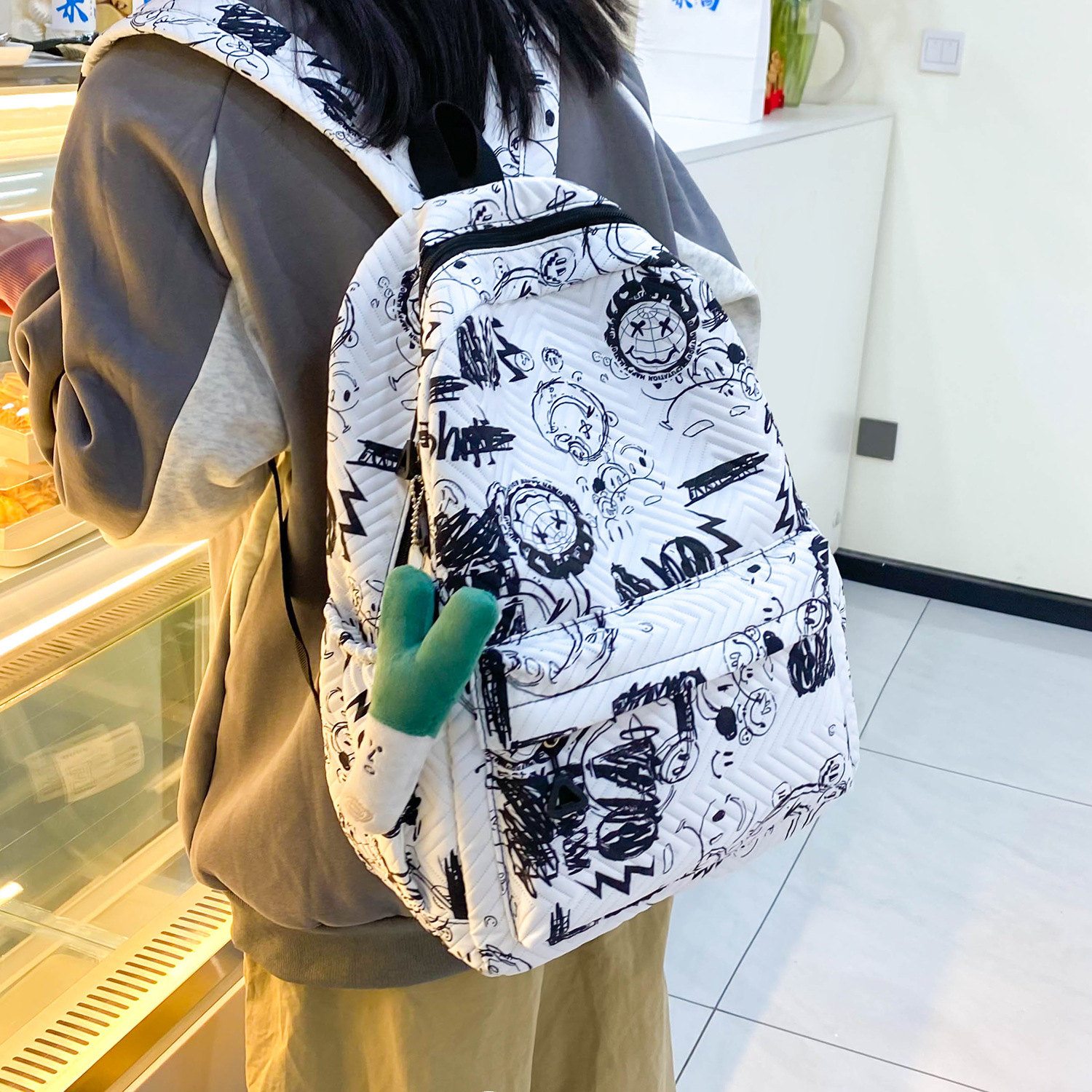 Large-capacity, high-end, 2024 simple graffiti, waterproof nylon fabric female college student schoolbag, casual backpack