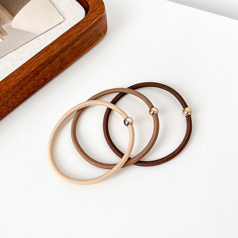 Korean Version Of The Basic Hair Circle Milk Coffee Color Thin Leather Band High Elastic Durable Small Bead Head Rope Simple Tie Hair Rope details Picture