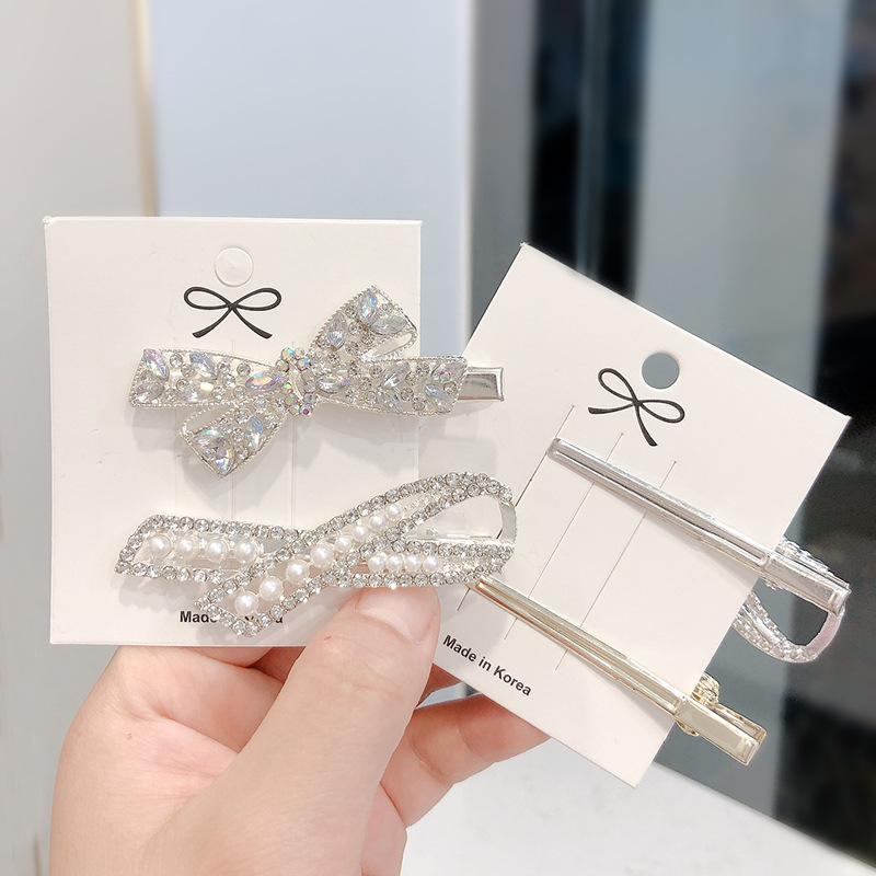 A simple Korean version with a bow, crystal full diamond edge and full free shipping alloy pearl water diamond duckbill clip Specification image