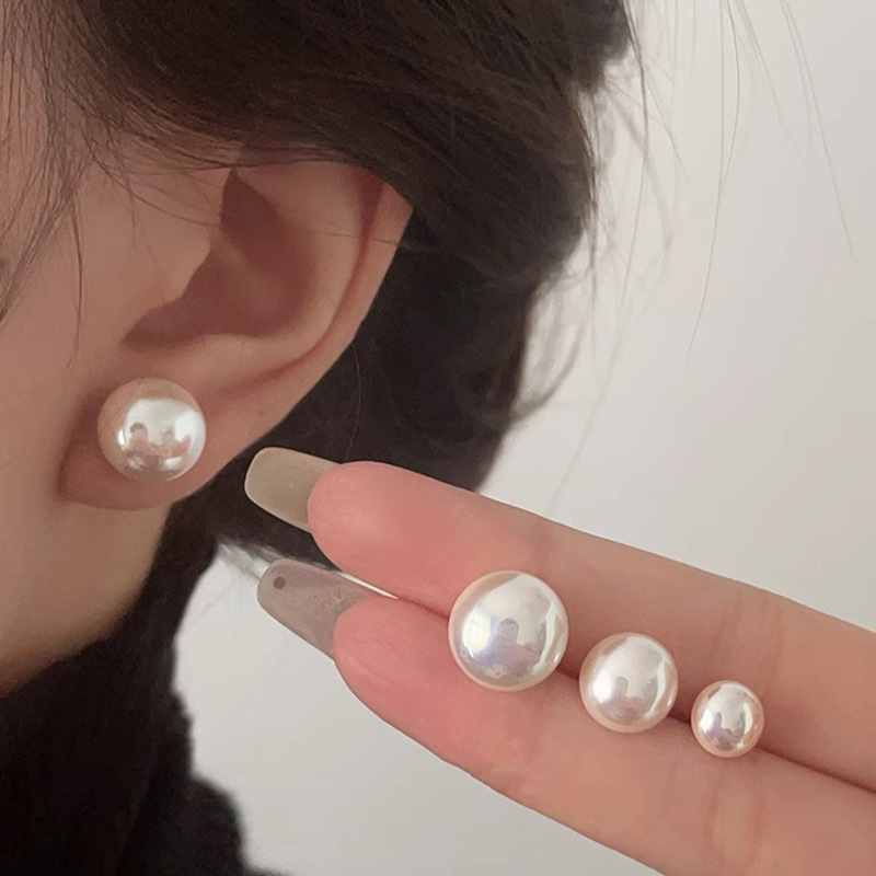 Shi Family Steamed Bun Pink Light Milk White Pearl Stud Earrings S925, pure silver needle, a niche high-end style, versatile new earrings details Picture