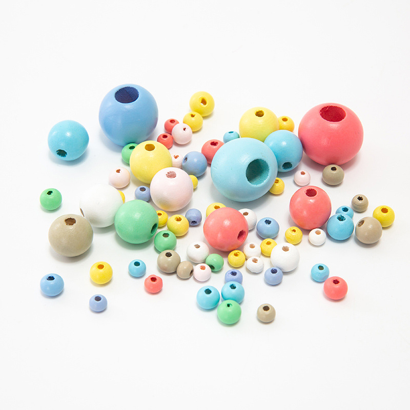 Factory direct supply of diy colored wooden beads, loose beads in stock, wholesale of children's bead materials, large-hole small wooden beads, candy colors Application Scenario