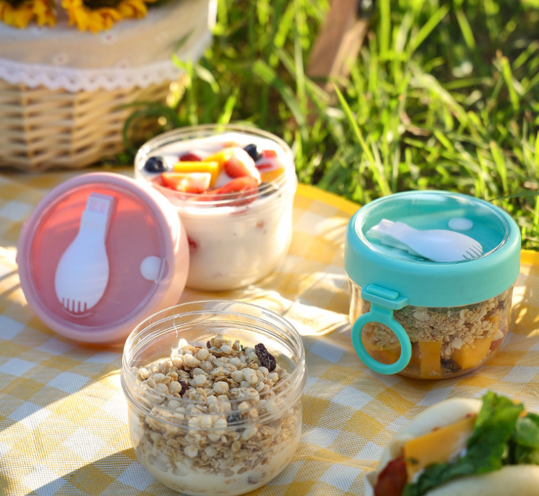 A sealed portable breakfast cup with a lid and a spoon Specification image