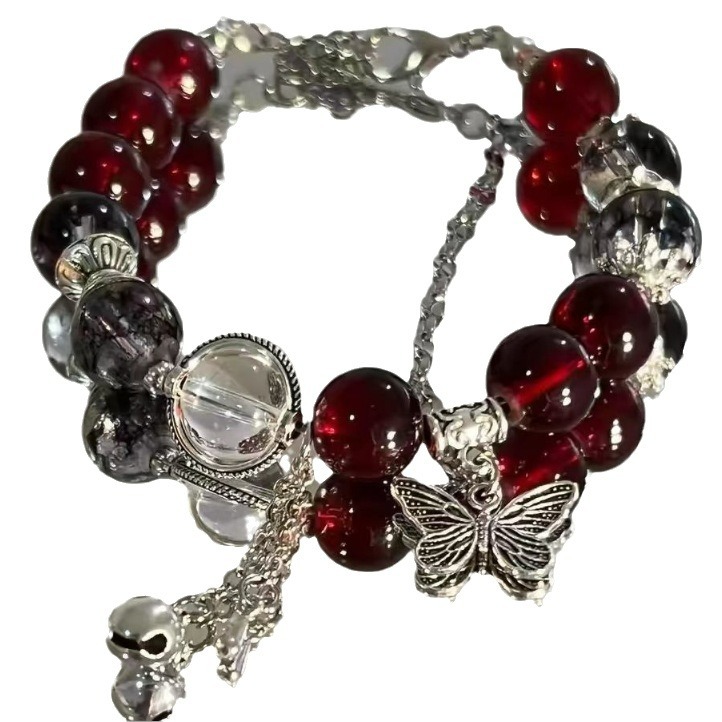 The four-piece bell-shaped butterfly bracelet with a crimson dream and a dark red crown exudes a unique and elegant charm. The deep red color scheme makes the skin look fair Item Picture