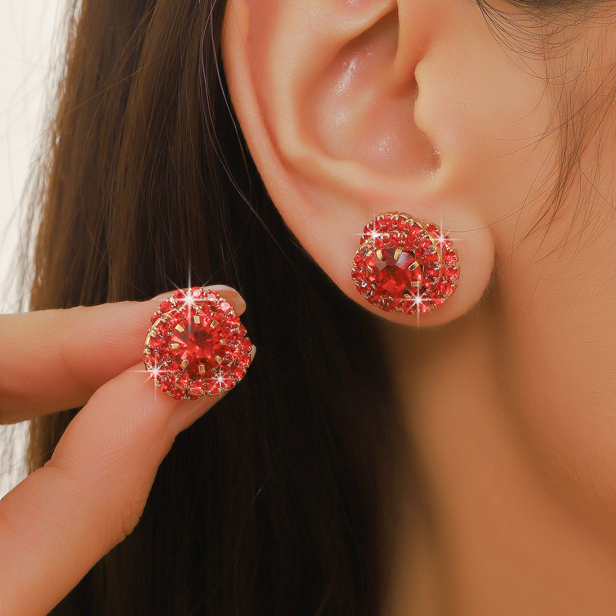 European and American cross-border earrings with a high-end feel. The delicate and small earrings are surrounded by zircon and welded copper claw chains and rhinocones