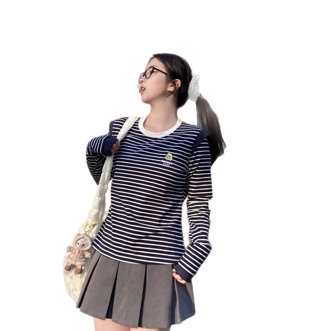 This is a new spring T-shirt for women, featuring a unique design with embroidered stripes on a husky. It has a straight shoulder and a slimming look, with a round neck and long sleeves Item Picture