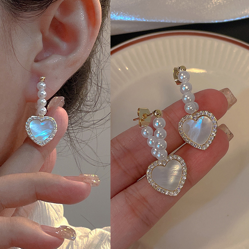 Pearl earrings with a gentle and niche design, pure silver earrings with a light luxury and high-end feel, the latest trend in 2022 details Picture