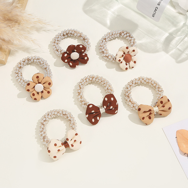 Dongdaemun hair accessories, headwear, bow ties, pearl cartoon bear hair bands, bun hairstyles, leather bands and hair strings from South Korea