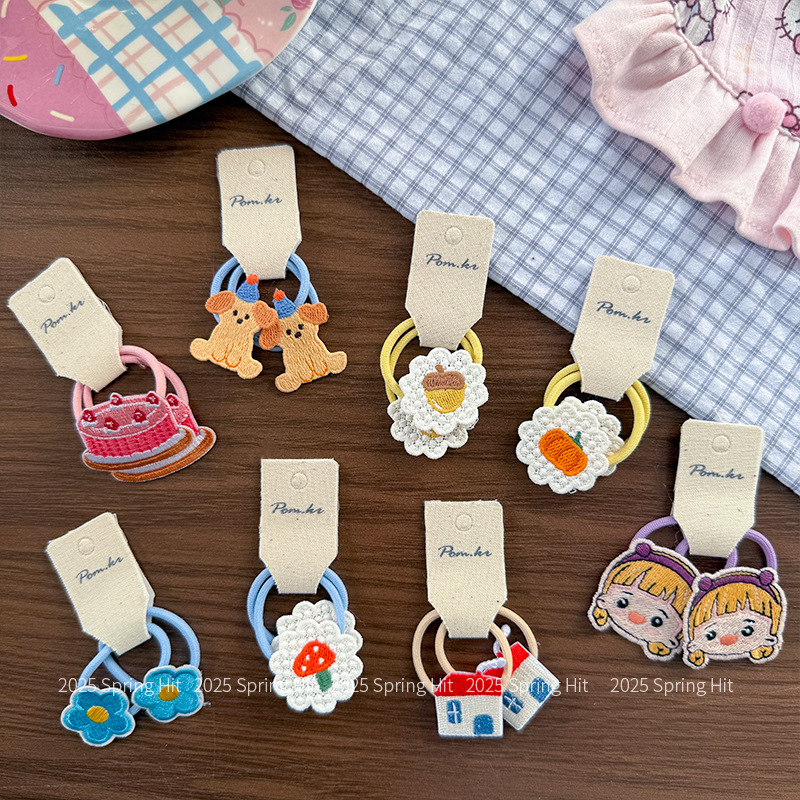 A new Korean-style children's fabric sweet girl flower hair rope for girls and babies, a versatile high-elasticity ponytail rubber band Application Scenario