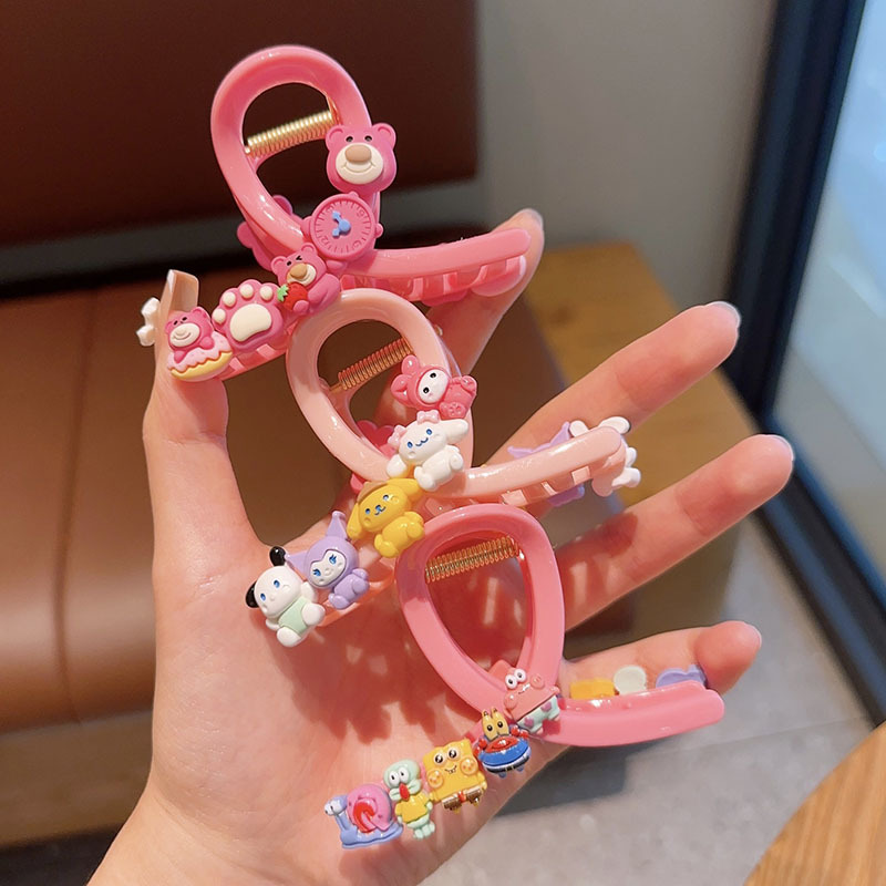 Cute cartoon children's scratcher on the back of a girl's head, strawberry bear, Sanrio hair scratcher, SpongeBob, shark hair accessory details Picture