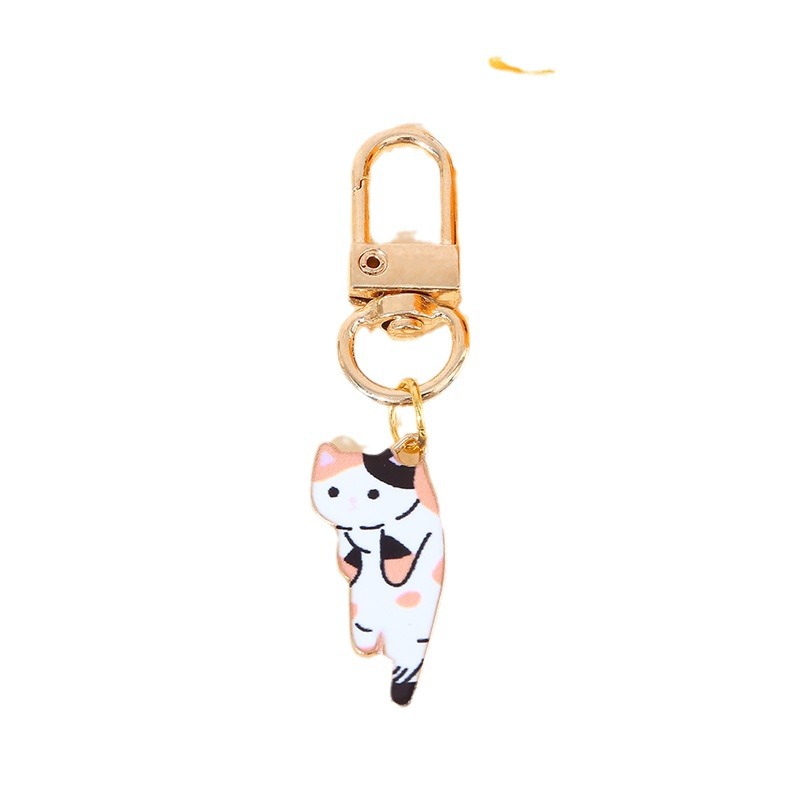 Creative and cute alloy cat pendants, mini car keychains, decorative couple bags, pendants and gifts in stock Item Picture