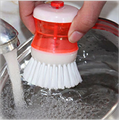 A kitchen wok scrubber