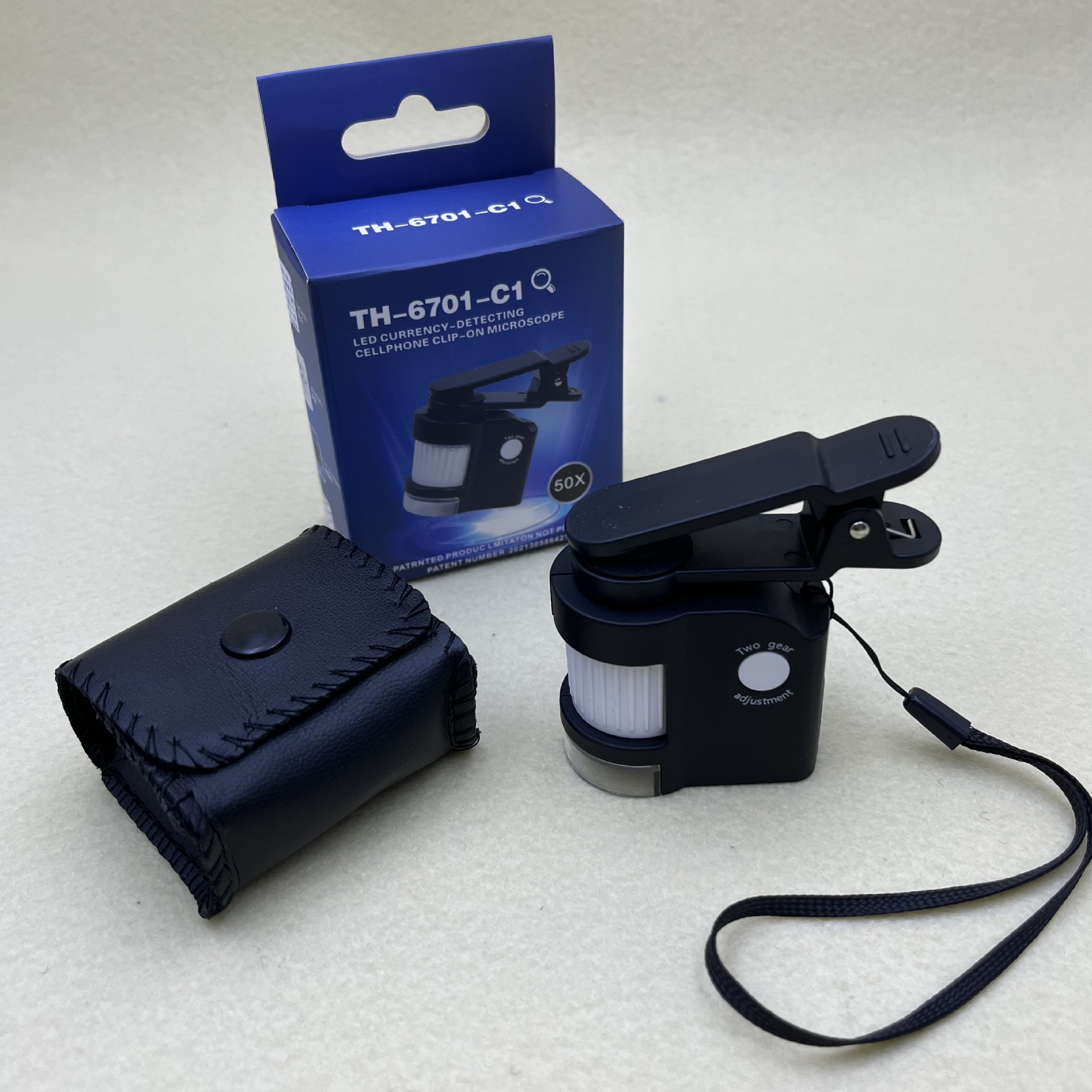 TH-6701-C1 portable phone holder microscope with UV lamp, LED lamp, 50x magnification wholesale magnifying glass