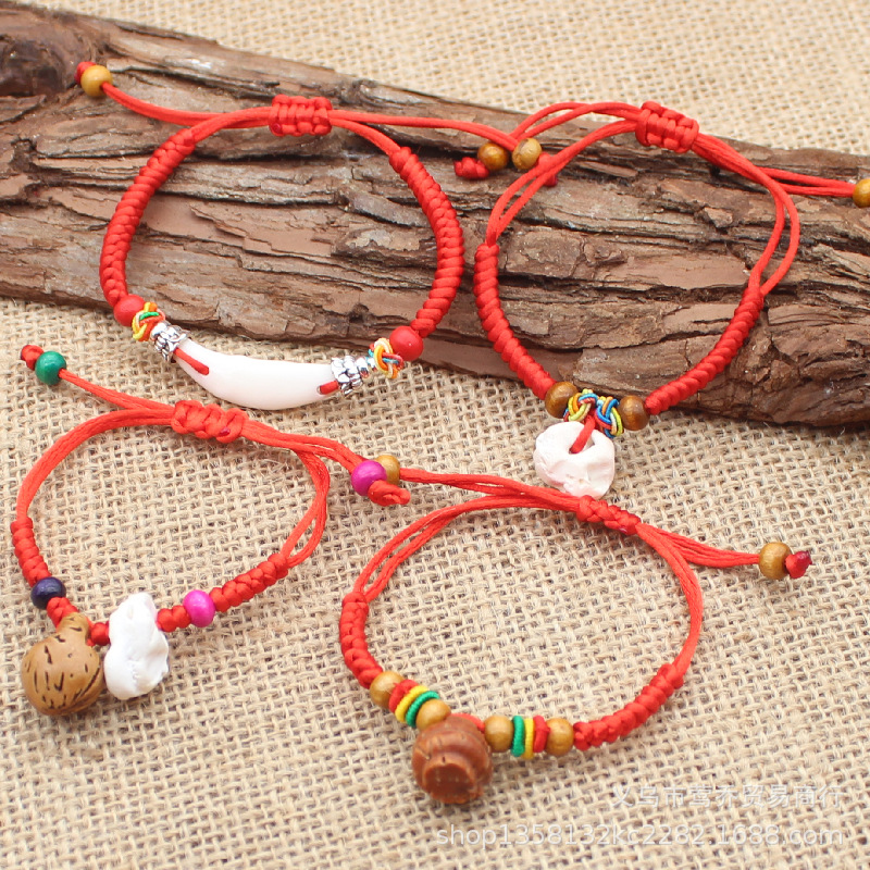 Shock baby bracelet baby's life year peach wood peach core Hu basket Dragon Boat Festival colorful red rope pig terror hand string gift full figure