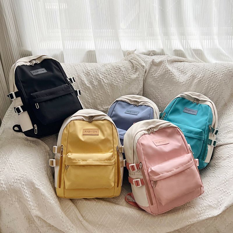 New nylon backpacks, fashionable color-blocked outdoor travel bags, simple schoolbags for junior high school boys and girls, and casual backpacks