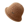 This autumn and winter knitted basin hat is a versatile match for women. It features a lambskin texture, a round top hat, a Korean fisherman's hat, and a black label woolen hat. It's artistic Item Picture