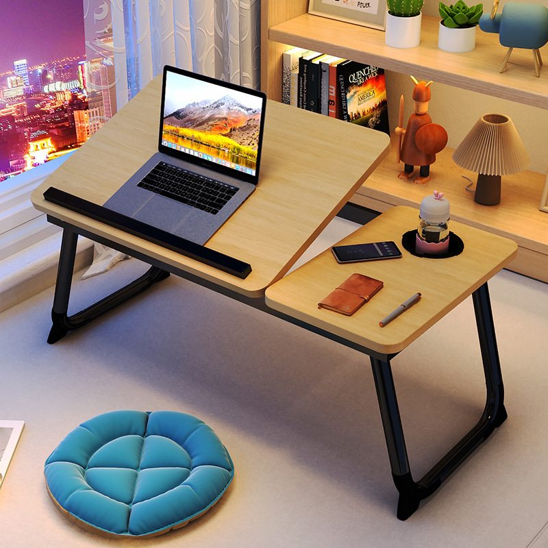 The small computer desk on the bed can be raised, lowered and folded. It is a home student writing desk for the bedroom and a lazy study desk for the dormitory Application Scenario
