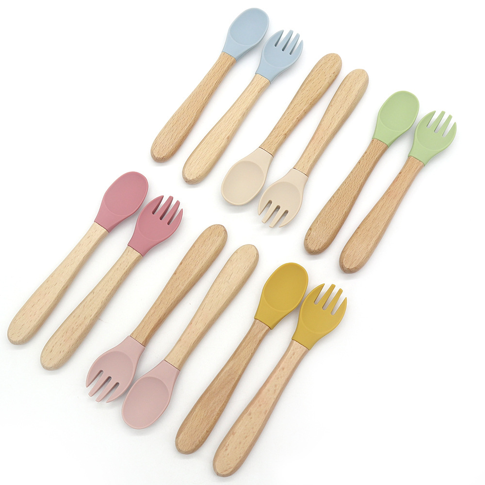 Cross-border bestseller children's forks and spoons, learning to eat complementary food spoons, baby spoons, upgraded small-headed wooden handles, soft silicone spoons Item Picture