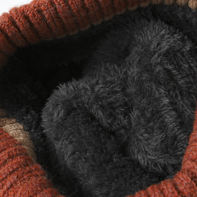 Woman wearing beanie indoors showing soft inner fleece lining