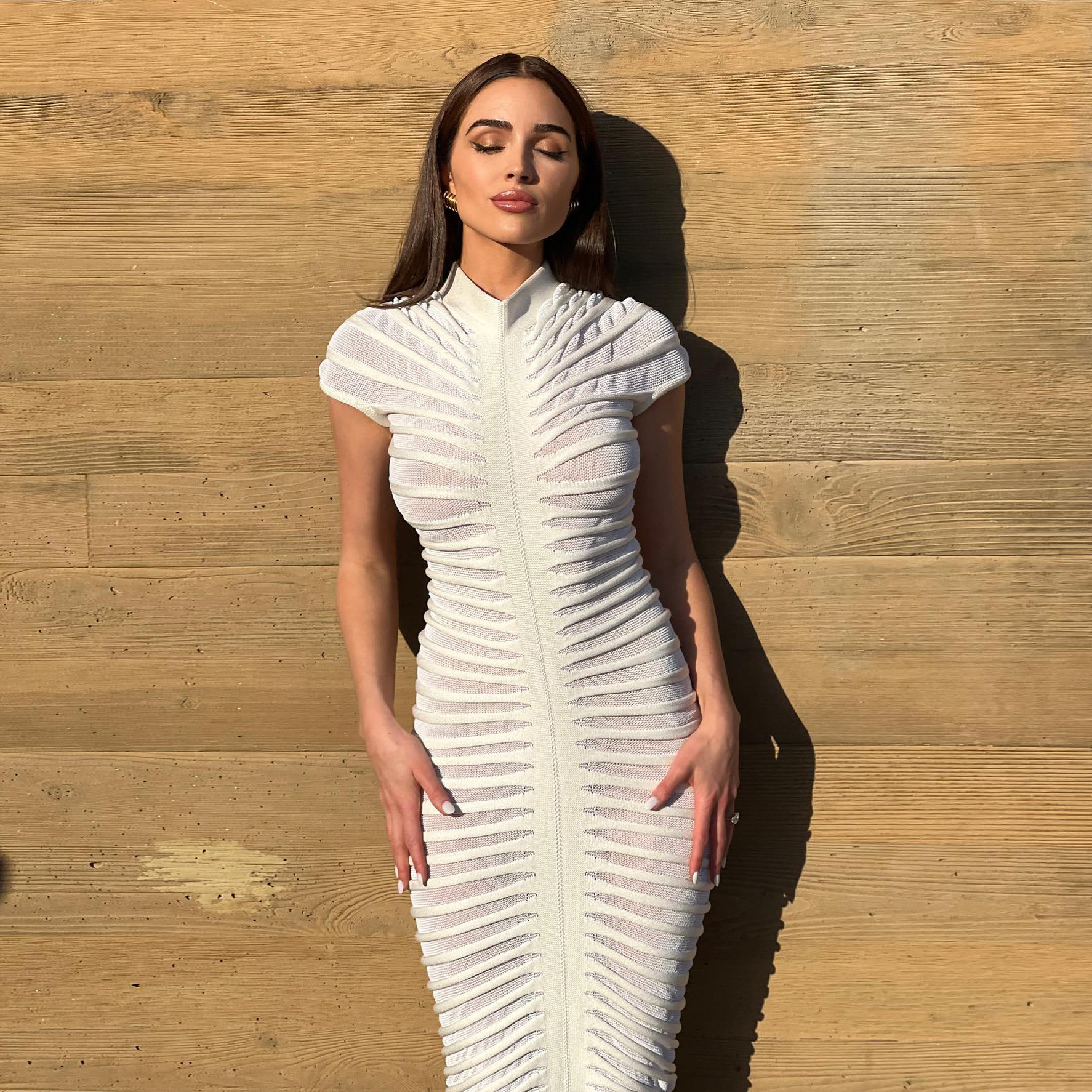 2023 autumn European and American women's fashion short-sleeved round-neck slim-fit dresses, sexy knitted long dresses for nightclubs and clubs