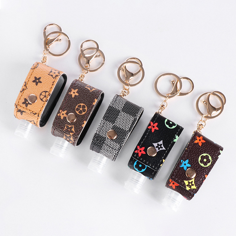 跨境新款钥匙扣PU皮套皮革花色30毫升梯形挤压式洗手液分装瓶皮套