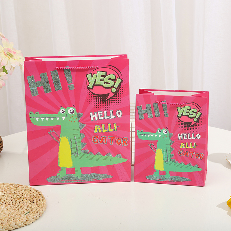 Cartoon Q-version dinosaur gift bags, hand-held bags, gilded and powder-coated paper bags, birthday return gifts and souvenirs, South American packaging bags Application Scenario