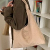 A niche suede bag, a retro women's light luxury new fashion large-capacity underarm bag, a casual and versatile commuter tote bag details Picture