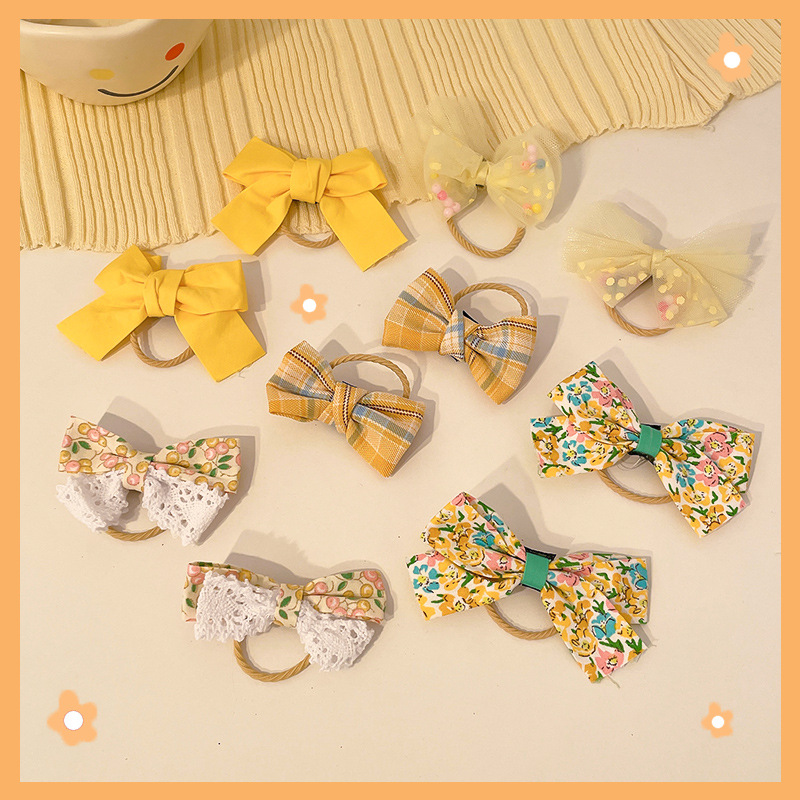 Cute pink hair tie for children. It won't hurt girls' hair. The hair tie is highly elastic and durable. Little girls can tie their hair in a ponytail Specification image