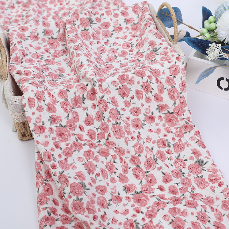 In stock, this is a fresh and light printed fabric with a white background of rose and chiffon with a bubble pattern Specification image