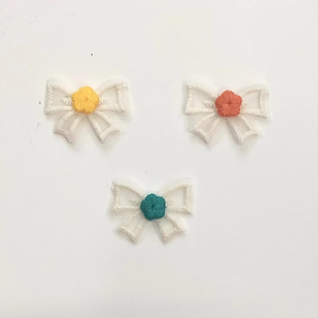 蝴蝶结/巧飞制花/水貂绒球球/刺绣布帖/段面圆点织带产品图