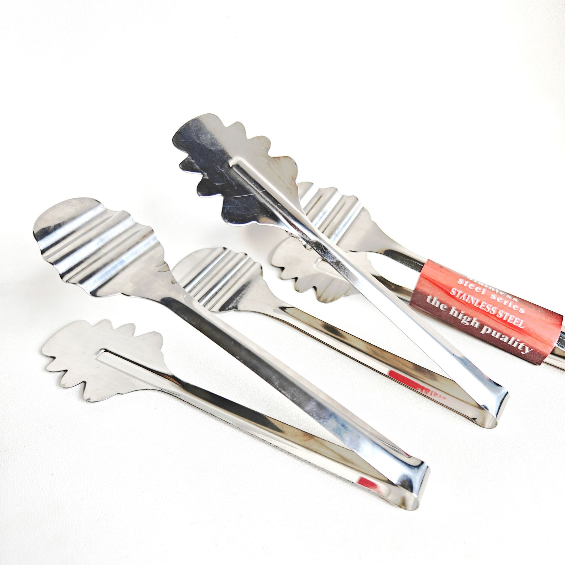Zone 1-1: Non-magnetic 7-inch [toothed] Food tongs 20/ pack 1000/ piece Non-magnetic 7-inch toothed food tongs Bread tongs, barbecue tongs, braised food tongs Household daily use 2 yuan wholesale supply