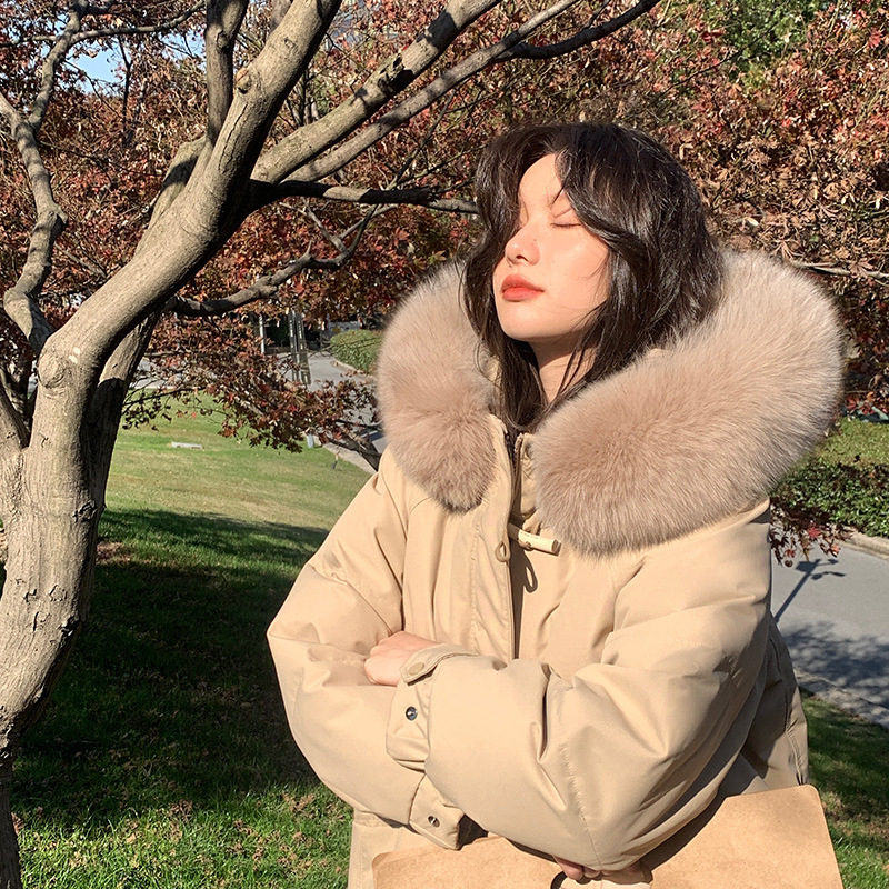 The 2022 new style of the popular down jacket for women, mid-length, is a fashionable knee-length loose, thickened wooden buttoned waist-cinching coat Specification image