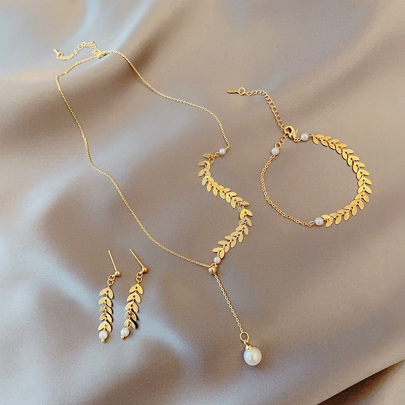 Three-piece set of niche design sense wheat ear pearl necklace earrings bracelet set cold wind simple Internet red head ornaments full figure
