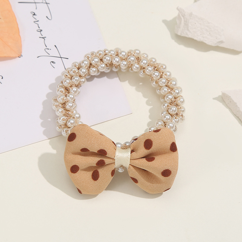Dongdaemun hair accessories, headwear, bow ties, pearl cartoon bear hair bands, bun hairstyles, leather bands and hair strings from South Korea details Picture