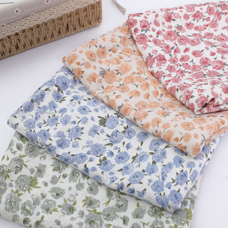 In stock, this is a fresh and light printed fabric with a white background of rose and chiffon with a bubble pattern details Picture