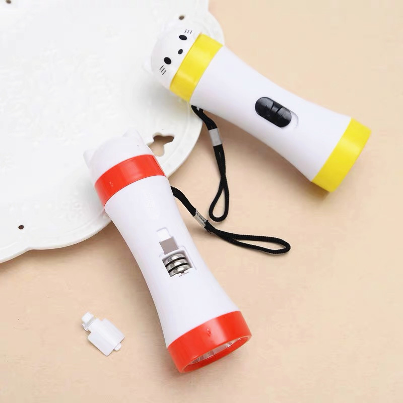 The new fashionable candy-colored kitten head flashlight led plastic small hand flashlight is a best-selling product in the 2-yuan home store Application Scenario