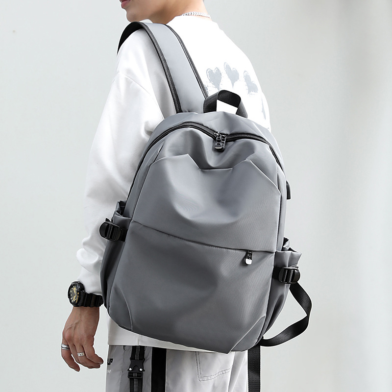 The new men's business backpack is simple, multi-functional, has a large capacity and can be equipped with a logo