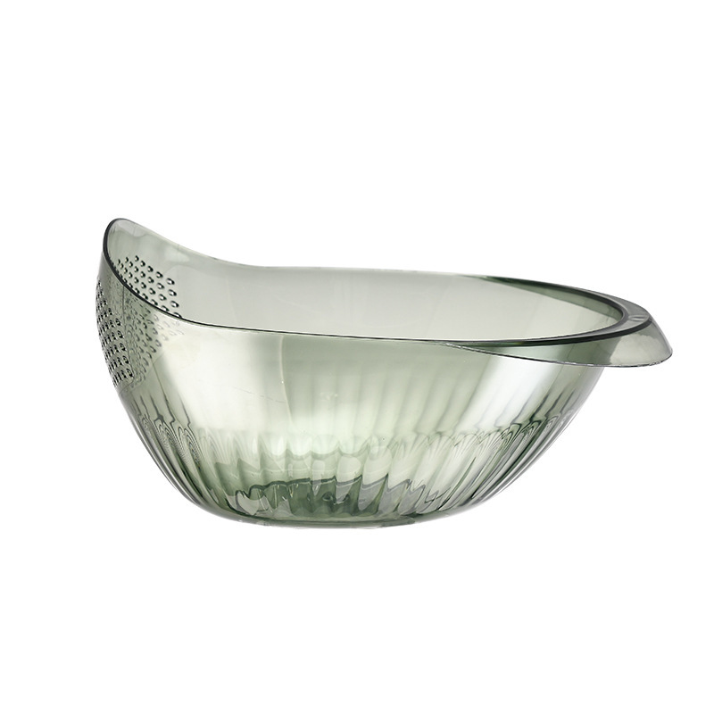 The simple fashion vegetable washing basket is a kitchen household wonder. It features a multi-functional plastic basin, a high-end double-layer fruit plate, and a convenient draining basket Item Picture