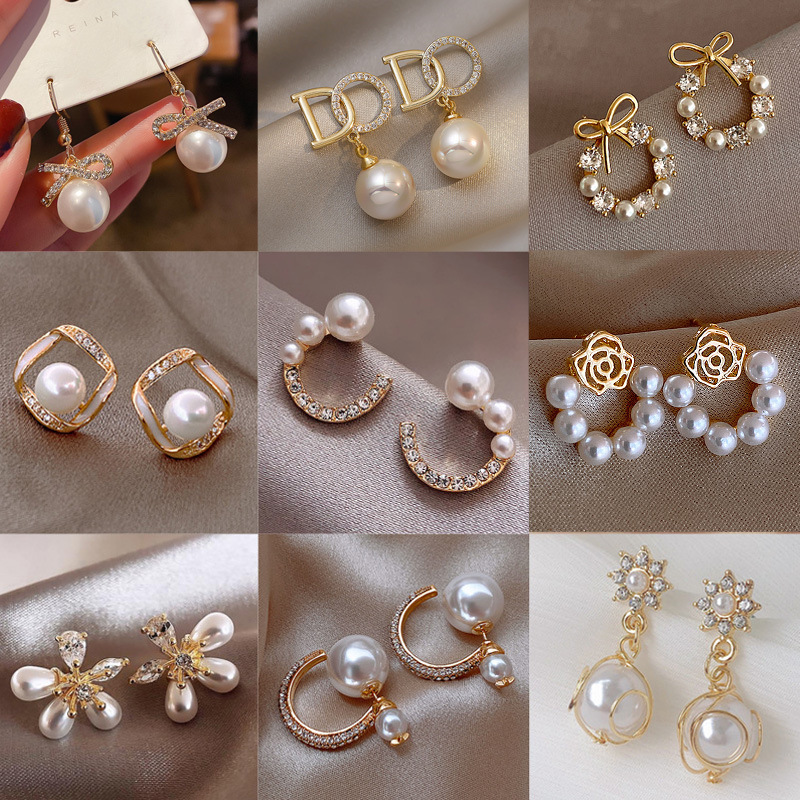 S925 Silver Needle 2023 New Temperament Simple Pearl Bow Earrings Senior Sense All Match Pearl Stud Wholesale