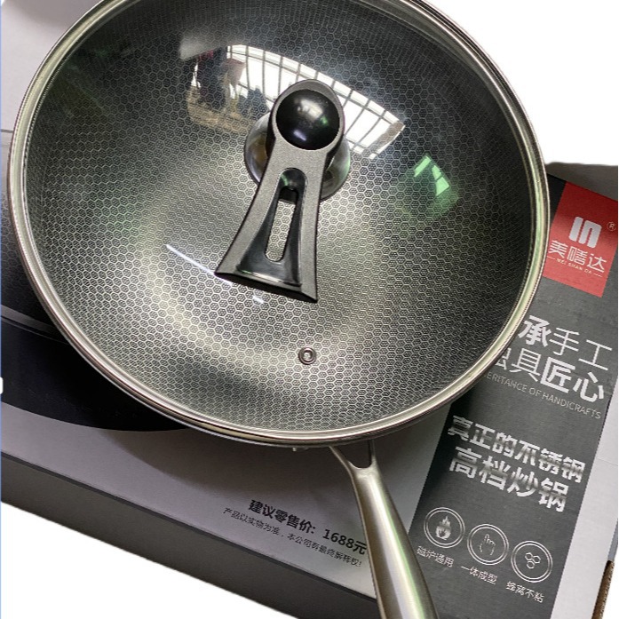 Stainless Steel Wok in Modern Kitchen Setting