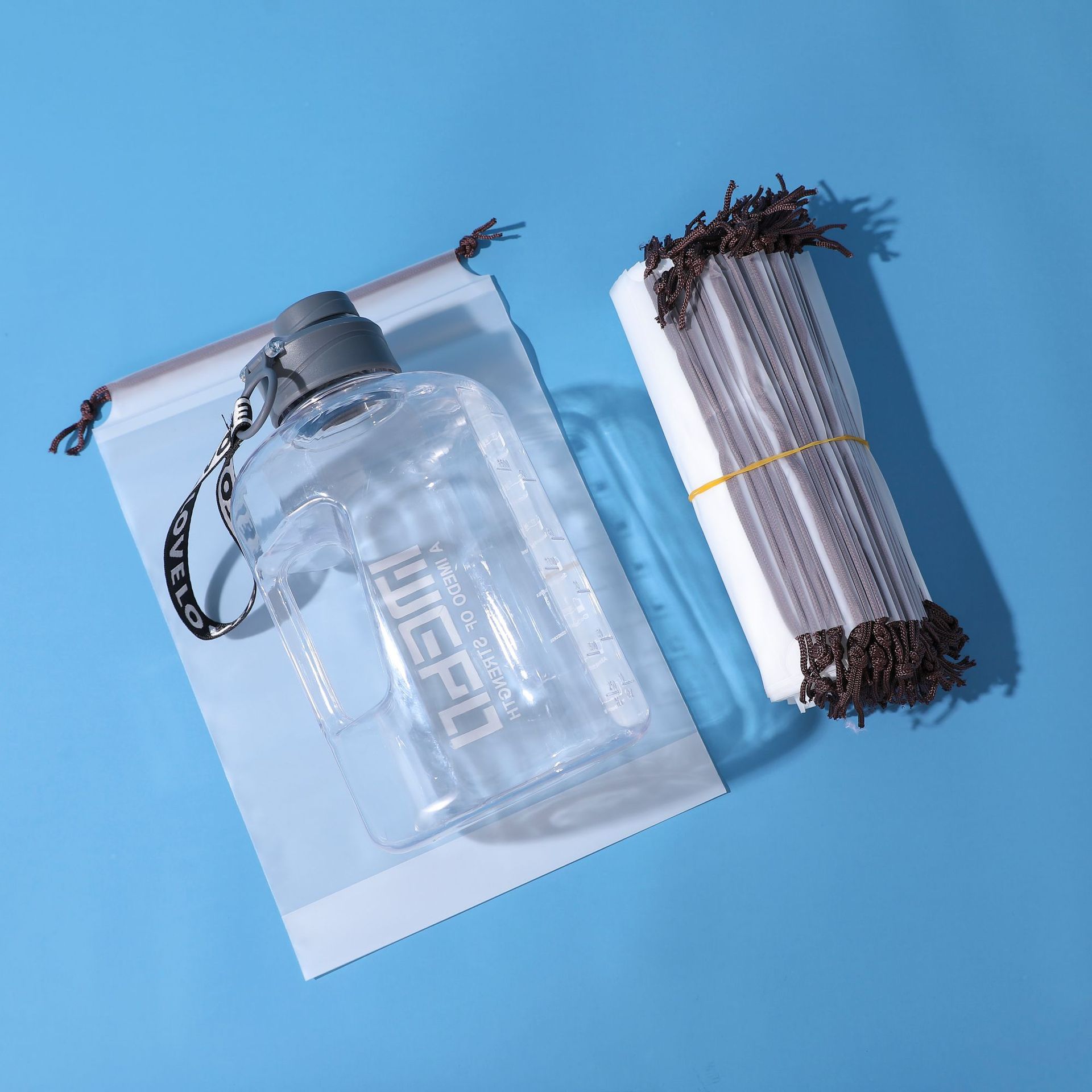 Wholesale and stock of transparent drawstring bags with matte, thickened, waterproof and dustproof packaging for travel clothing storage Application Scenario