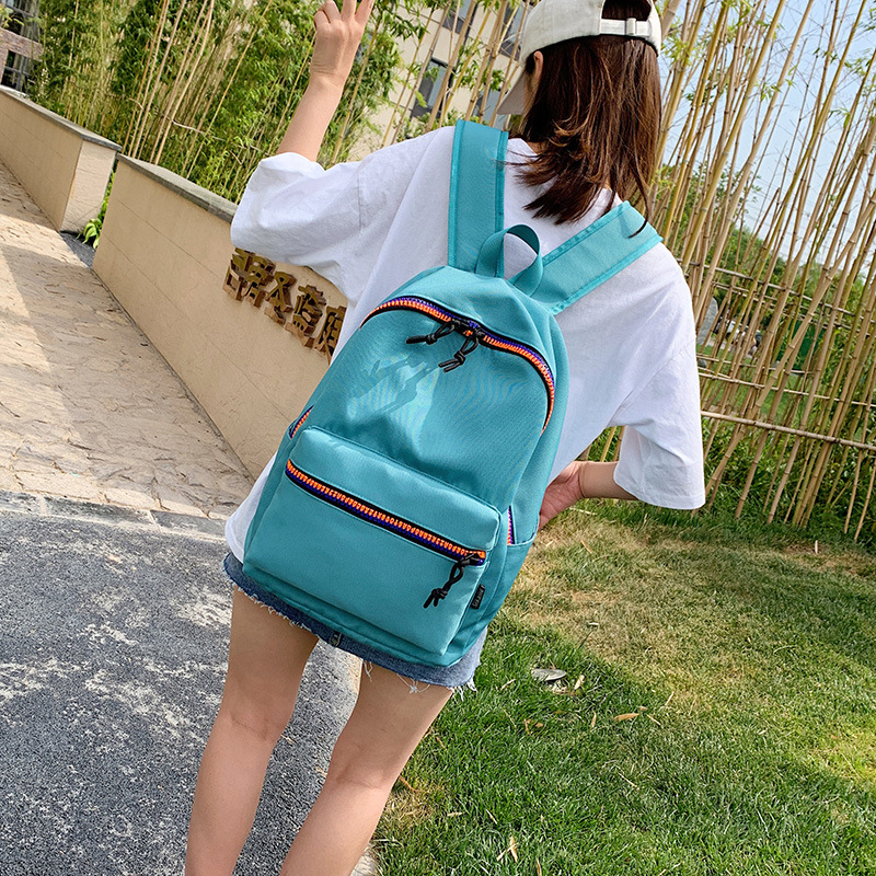 双肩包女新款潮流书包中学大学生休闲旅行中性引闪纯色牛津布背包详情5