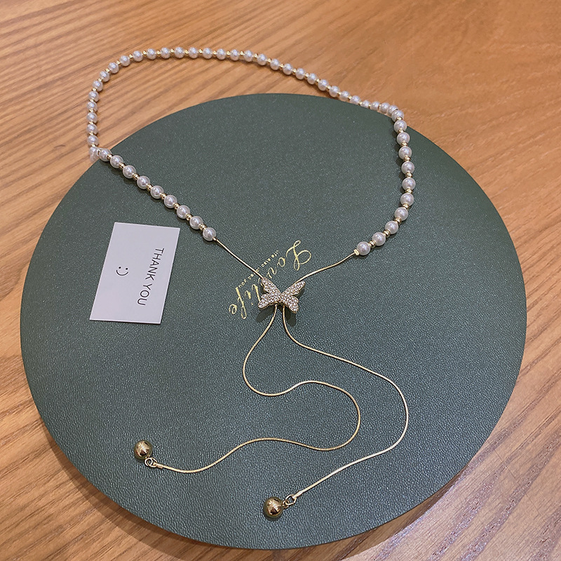 Douyin's best-selling pull-out pearl necklace, a versatile and niche design for women, butterfly pendant, collarbone chain accessory wholesale Specification image