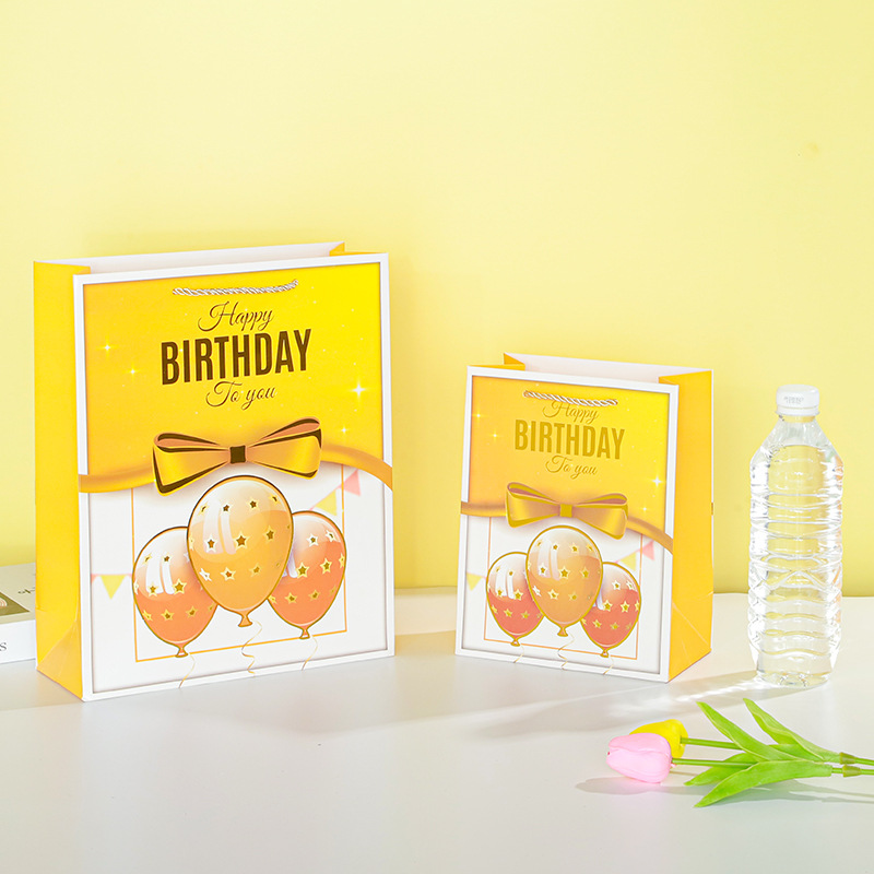 Colorful birthday balloons, happy gift bags, wedding gift paper bags, birthday return gifts, and souvenir packaging bags from South America details Picture