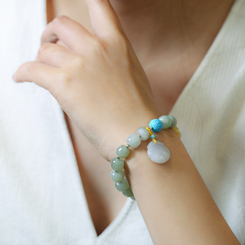 Natural gradient Hetian jade pendant peace lock bracelet, amber flower and turquoise meander bead retro jewelry for women Application Scenario