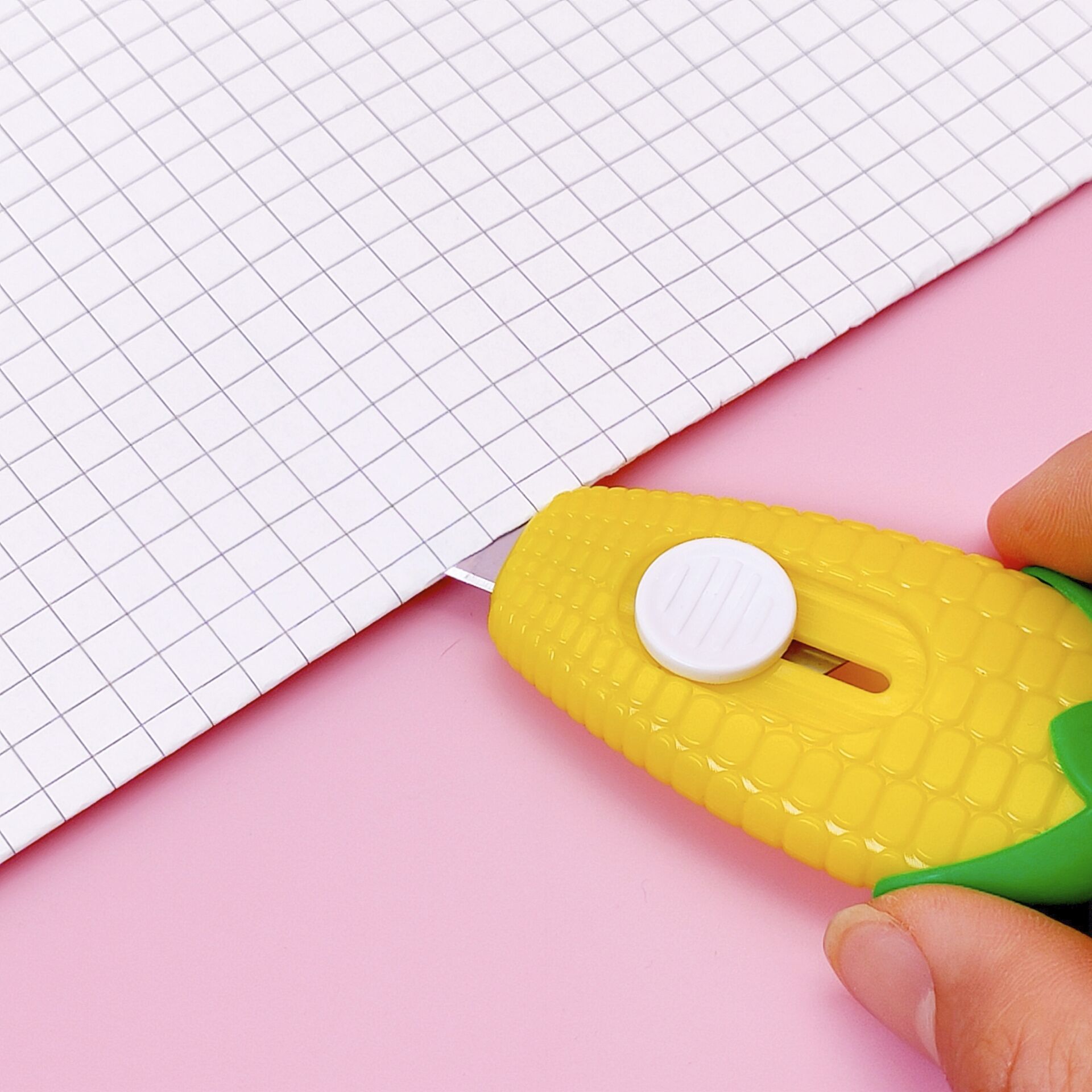 Cartoon corn mini utility knife, student cute wallpaper knife, paper cutting knife, small parcel opening and unboxing knife wholesale Application Scenario