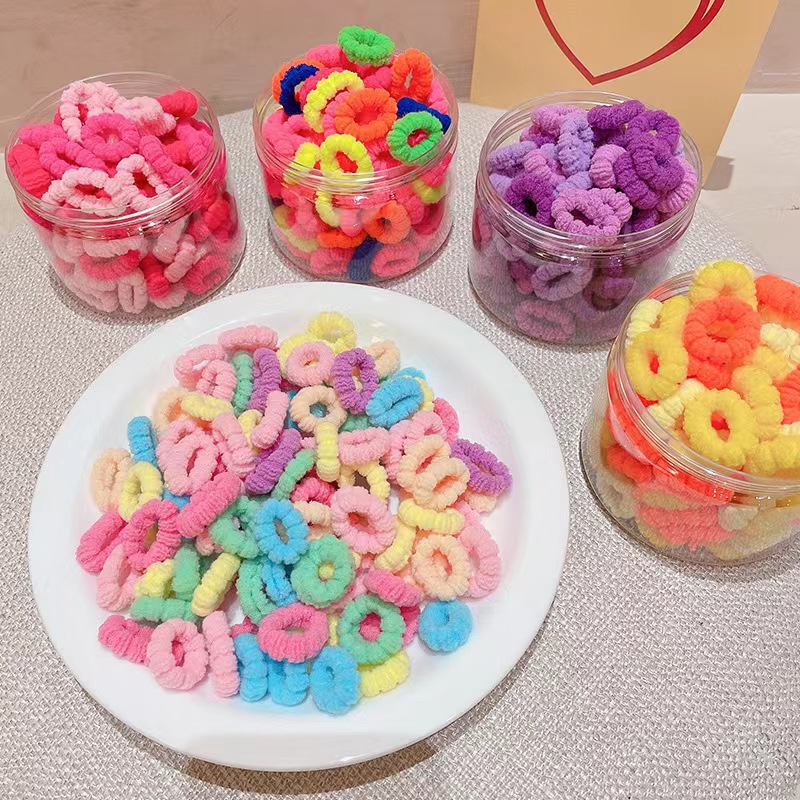 Wholesale of 100 boxed colored thumb children's headbands, small rubber bands, ins high appearance level and high elasticity hair band headwear Specification image