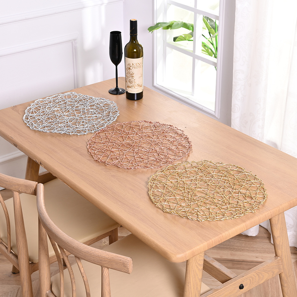 Wholesale of Nordic minimalist placemats, heat-insulating table MATS, wire woven household Western food bowl and plate MATS, round plates and teacup MATS details Picture
