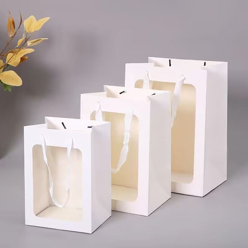 Wholesale of new creative windowed single-color handbags, square-bottom paper bags, hand-held paper bags, flower packaging bags and gift bags Application Scenario