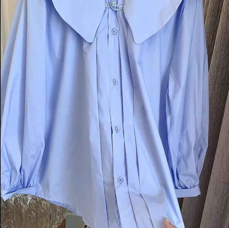 New Chinese-style, button-up, doll-collar, puffed-sleeve long-sleeved shirt for women, with a unique design sense and a 2022 spring trend Item Picture